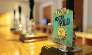 Molten Gold Hoppy Golden Ale by The Wily Fox Brewery in Wigan