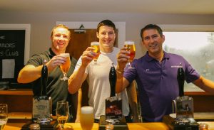 Kris Radlinski, Joel Tomkins & Phil Cox giving a ‘cheers’ after pulling a glass of beer